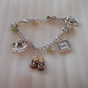 Avon - Mom's Treasure Charm Bracelet  330